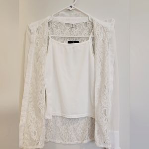 white woman's blouse with gold buttons